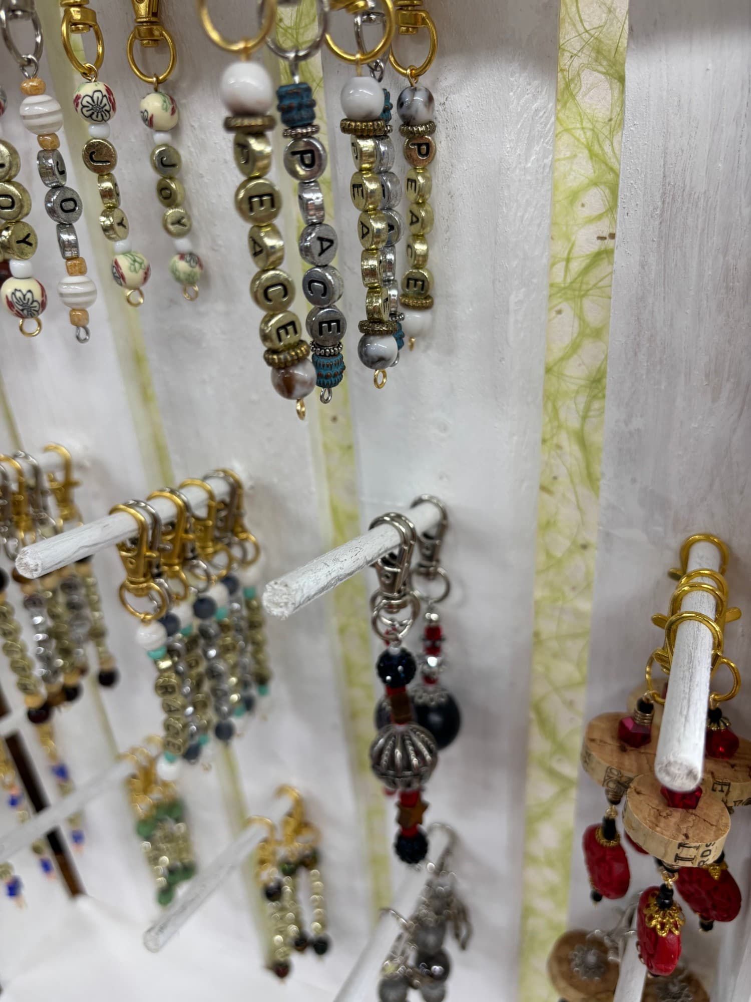 A wall display of word charms