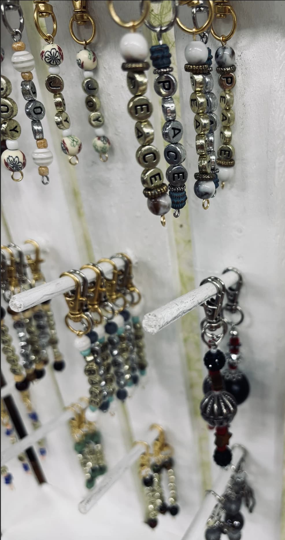A wall display of word charms